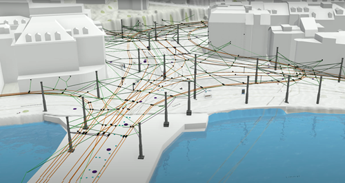 3D-Stadtmodell eines Straßen- und Straßenbahnnetzes mit zahlreichen farbigen Leitungs- und Infrastrukturdaten, dargestellt entlang des Neumühlequais an der Haltestelle Central in Zürich.